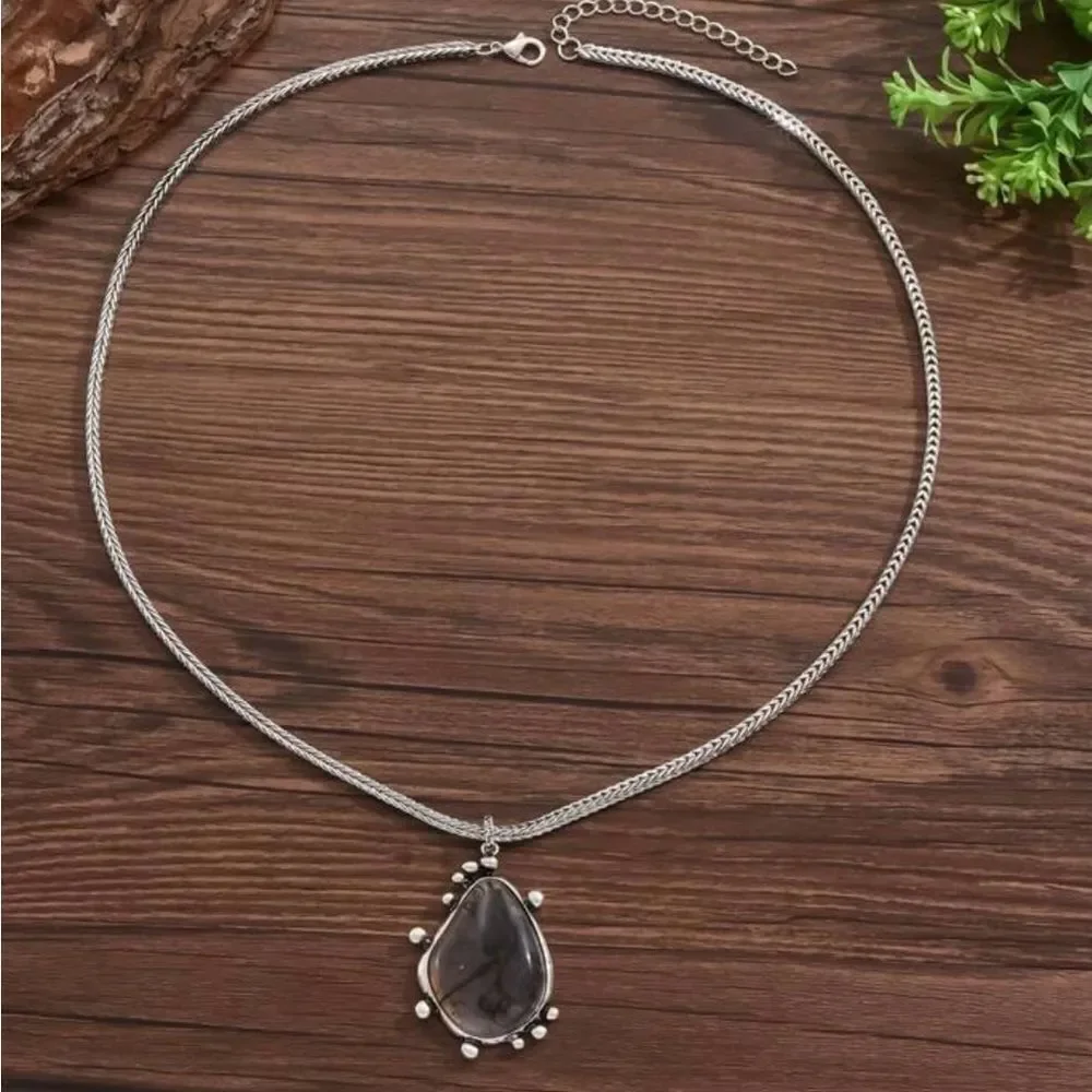 Elegant Silver Tone Pendant Necklace with Unique Stone Design - Picture 2 of 4
